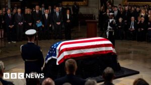 Jimmy Carter lies in state after procession to…